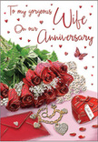 The image presents an anniversary card arranged as a romantic vignette, reminiscent of a quiet evening indoors after a riverside walk through Barnes. At its core, a small cluster of red roses commands attention, the flowers in full bloom with thick, velvety petals unfolding in tight, sumptuous spirals that speak of devotion and warmth. Surrounding the roses, glossy green foliage arches outward, adding a natural, almost hand-tied look that softens the bold red. Just beside the blooms lies a pale, neatly placed envelope, slightly overlapped by the flowers as though recently set down after writing a heartfelt note. A heart-shaped keepsake box in gleaming red sits nearby, its smooth, rounded lid accented by gentle reflections, hinting at treasured pieces stored within. A slender piece of jewellery-likely a bracelet or fine necklace-rests in an easy curve along the surface, its metallic shimmer catching the light like a small, private sparkle. Scattered around are dainty heart motifs, sprinkled across the card in varying sizes and intensities, drawing the eye naturally toward the gracefully scripted anniversary message at the centre. An illustrated butterfly appears in the composition, its wings open in a delicate pose, adding a feeling of lightness and romance. The overall palette blends rich reds, fresh greens, warm metallic tones, and soft cream accents, all unified by gentle, diffused lighting that lends the scene a tranquil glow. This carefully balanced tableau feels both personal and timeless, perfectly capturing the mood of an anniversary celebrated in the peaceful surroundings of Barnes.